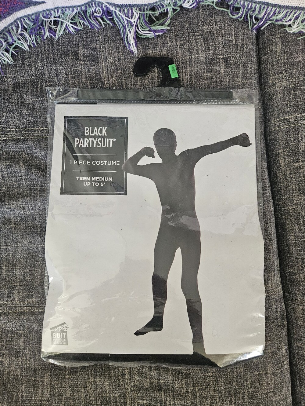 Black one-piece Partysuit Costume in a teen medium size.